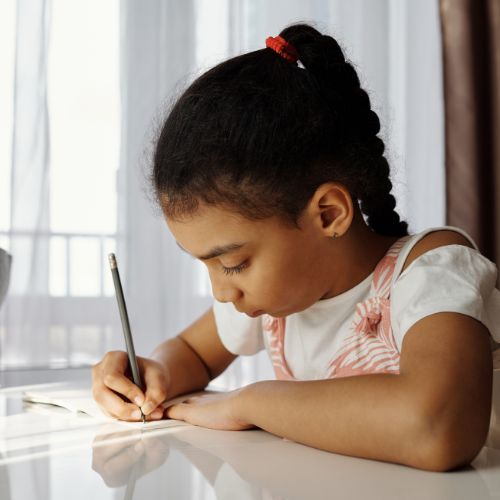 Girl focused on her homework